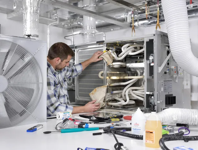 Rockland Air Duct Cleaning specialist performing precision AC coil cleaning in Rockland